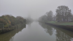 October. 
River Witham, Boston from the Grand Sluice bridge looking towards St Botolph's (The Stump) shrouded in mist, 25/10/2024 Select this image to see a larger version. 